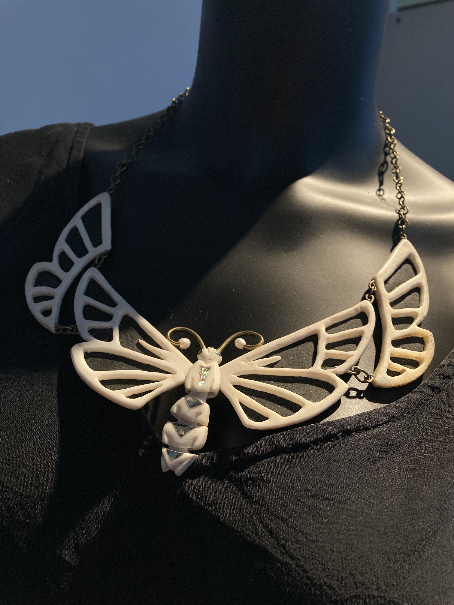 Moth-necklace-bone-and-leather